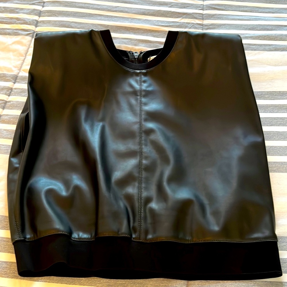 Black brand new Leather, shoulder pad shirt.